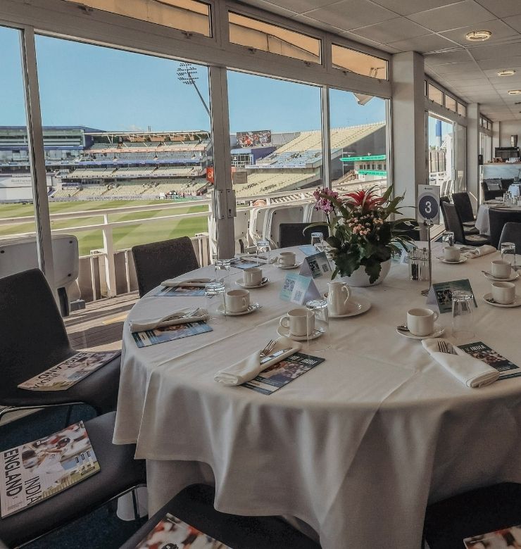 hospitality table with cricket pitch in background