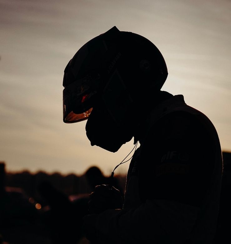 Driver with a helmet on