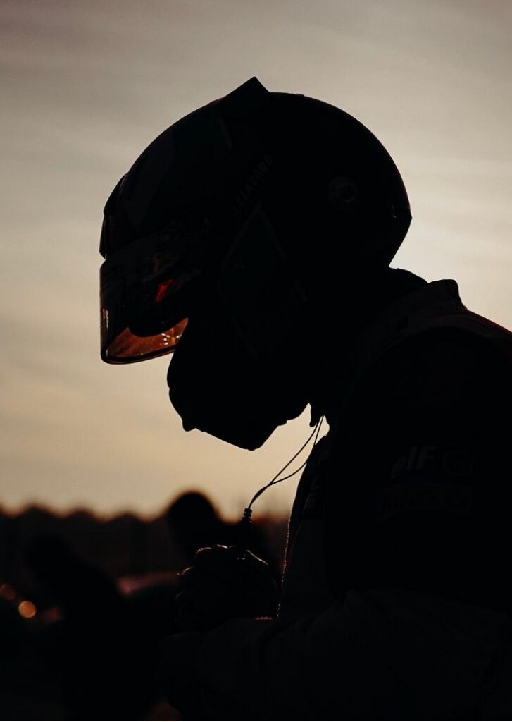 Driver with a helmet on